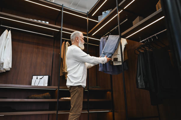 istock Senior man buying clothes in the store. 2177780757
