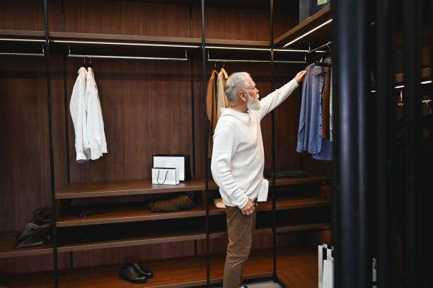istock Businessman shopping in clothes store 2177780803