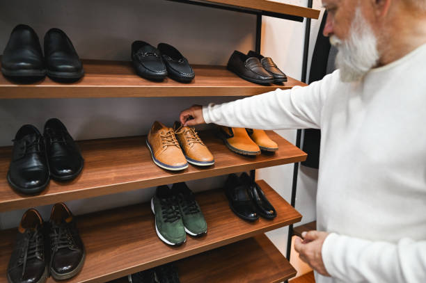 istock shopping at shoes store. 2177780925
