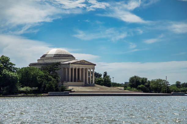 istock Jefferson Memorial reflecting on the Tidal Basin in Washington DC under a bright blue sky 2177783703