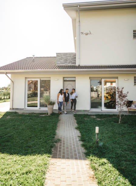 istock real state agent showing the new house 2177784575