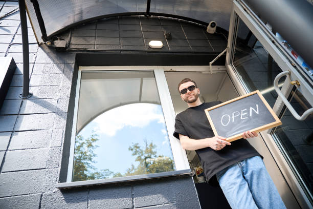 istock Stylish worker inviting to salon for haircut 2177784945