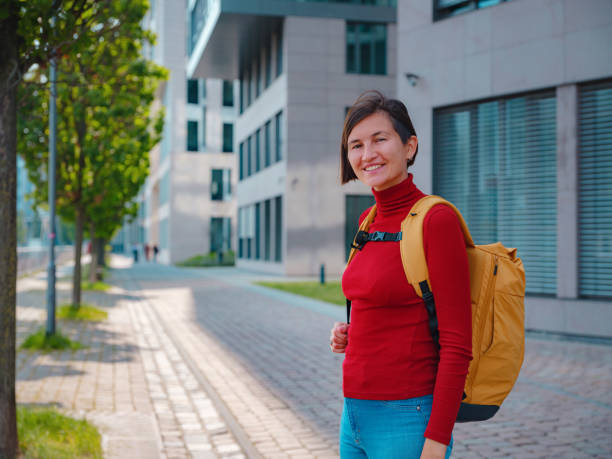 istock Tourist woman explores modern Frankfurt, 2177787320