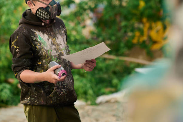 istock Graffiti artist in protective respirator 2177792687