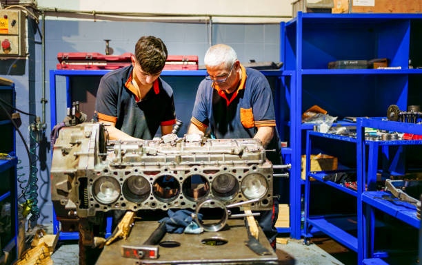 Student Studying For Auto Mechanic Apprenticeship At Vocational Education