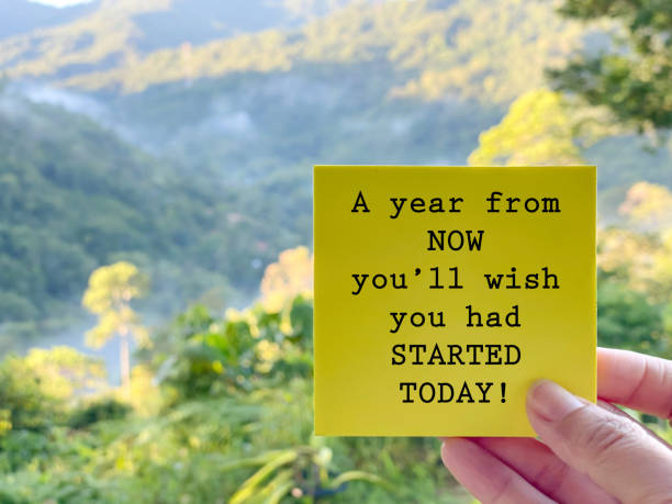 Inspirational Quote A year from now you'll wish you had started today text on paper with nature background. Stock photo. just do it stock pictures, royalty-free photos & images