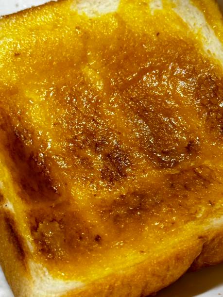 Homemade Warm Buttered Toast for Breakfast on a Plate