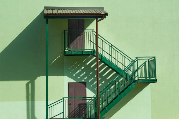 a set of stairs and its surrounding walls or structure, light green