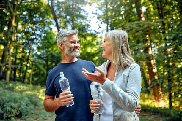 istock A Happy Couple Enjoying a Great Refreshing Hike Together in Natures Beautiful Scenery 2177802103