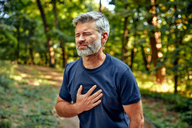 istock A Man Experiencing Discomfort and Unease While Being Outdoors in the Lush Greenery 2177802107