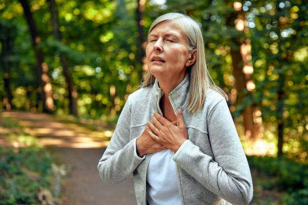 istock A Woman Experiencing Discomfort and Unease While Being Outdoors in the Lush Greenery 2177802142