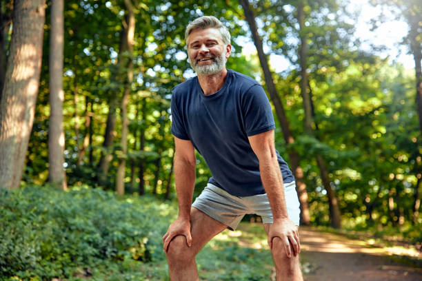 istock An active man taking a muchneeded break during his outdoor workout in the nature surroundings 2177802144