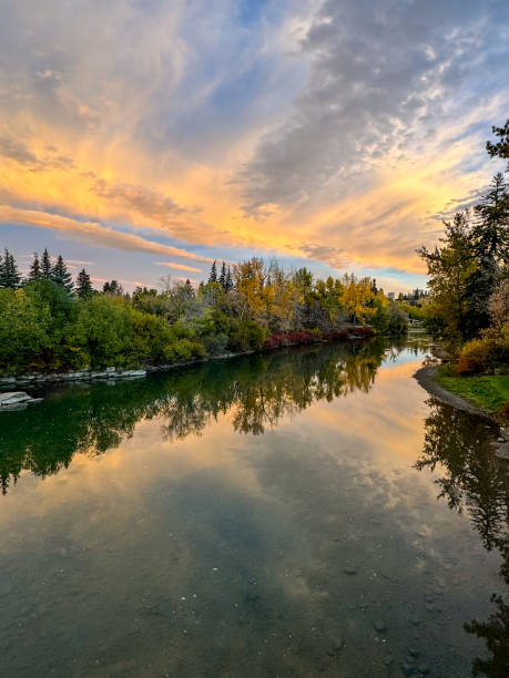 istock Dramatic sunrise sky and fall colours over the Elbow River in Calgary, Alberta 2177806195