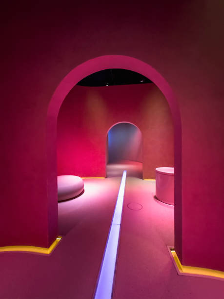 Pathway with pink lights and door arches