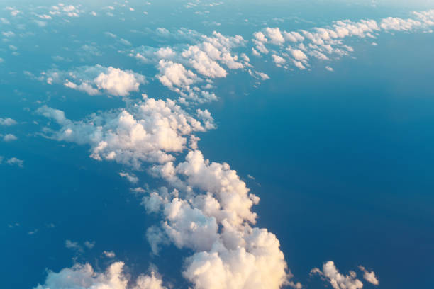 Panorama of clouds over blue ocean