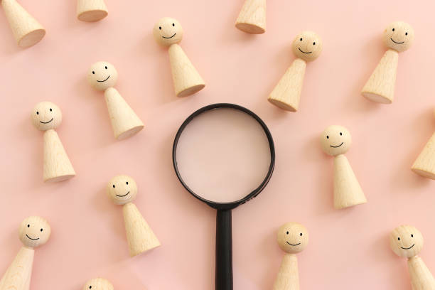 istock image of cubes with people figures and magnifying glass, human resources, leadership and management concept 2177814801