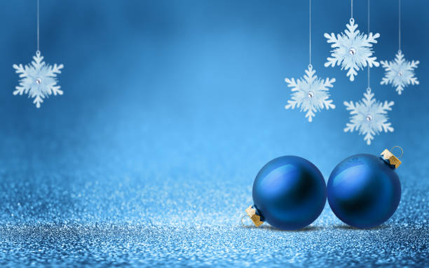 istock Christmas tree bauble and hanging snowflake on glitter blue background with bokeh light. Festive winter holiday decoration and ornament. 2177815922