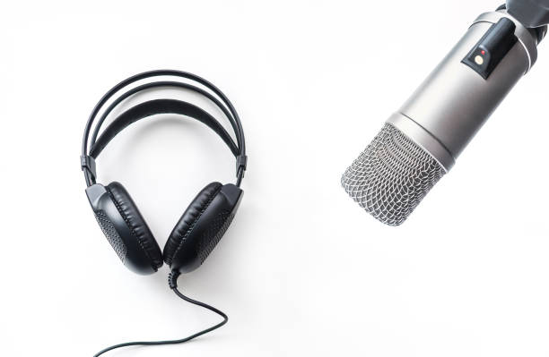 istock Background with a professional microphone and headphohes 2177816824