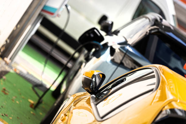 istock electric cars charging background 2177818196