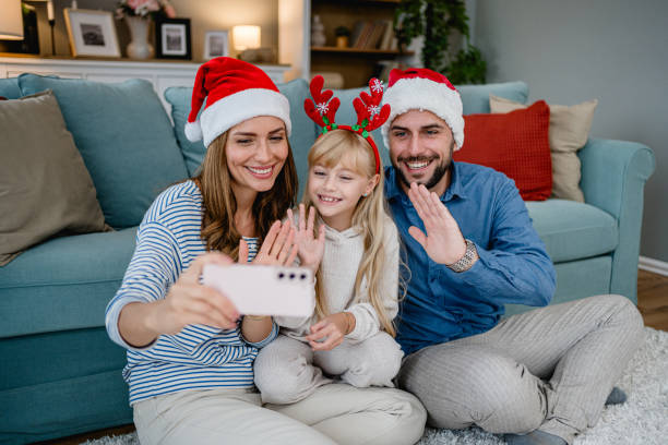 istock Family making video call on Christmas day 2177821228
