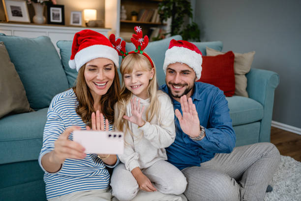 istock Family making video call on Christmas day 2177821399