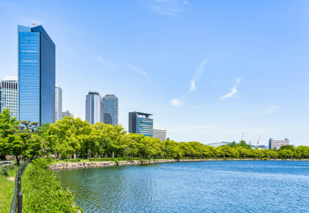 istock Modern glass skyscrapers near Osaka Castle. 2177821712