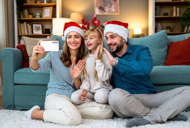 istock Family making video call on Christmas day 2177821874