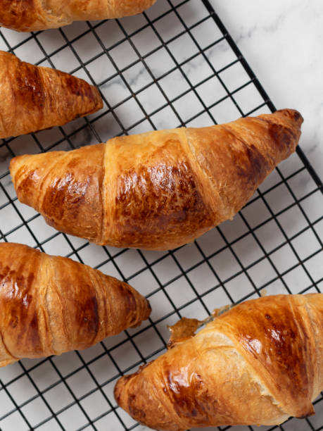 istock freshly baked delicious croissants, pastries 2177823168