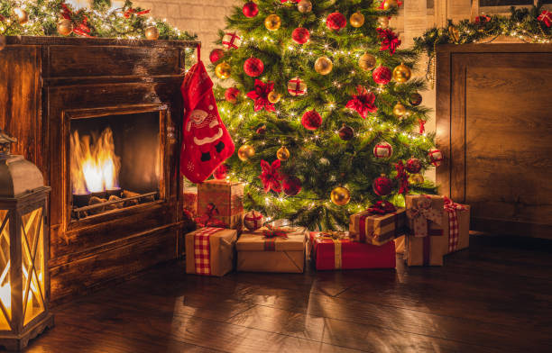 istock Decorated Christmas tree near fireplace 2177826548
