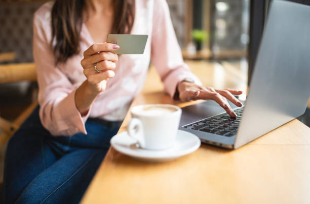 istock Online shopping at a coffee shop. 2177828037