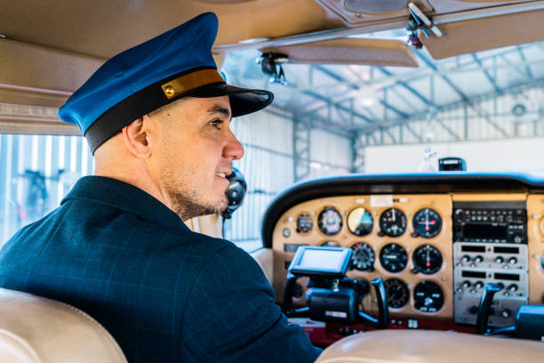 istock Mid adult pilot at private airplane 2177833921