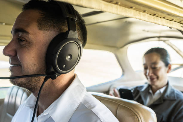 Close up of pilot headphones in the cockpit of a small propeller plane