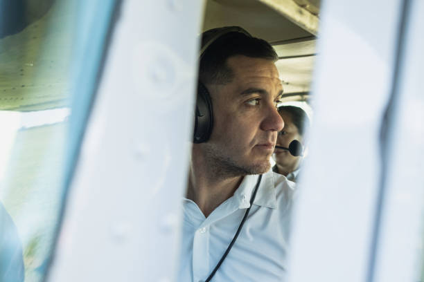istock Airplane pilot flying with passengers in a private plane 2177833988