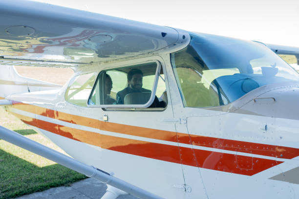 istock Airplane pilot taking business people on a private plane 2177833999