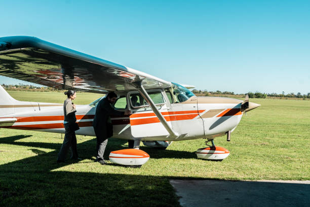 istock Business persons entering on a private airplane 2177834118