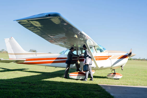 istock Business persons entering on a private airplane 2177834144