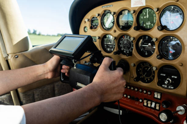 Close-up of a pilot flying an airplane