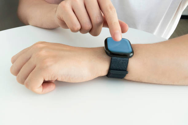 istock Smart watch, wearable gadget. Young man using electronic smartwatch on his hand. 2177834516
