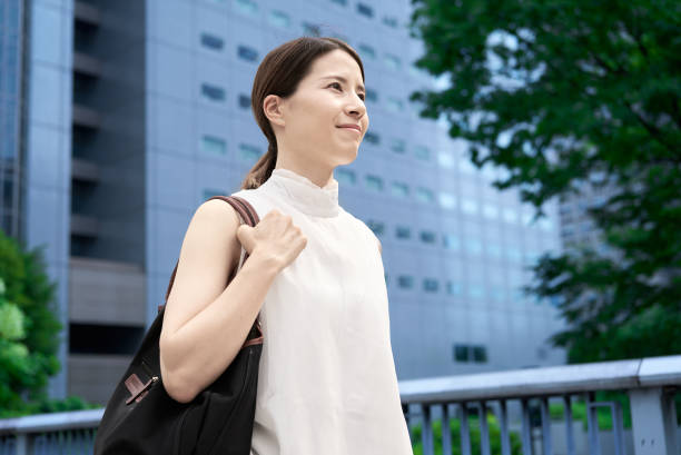 istock A woman commuting in a business district 2177834883