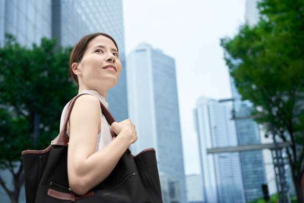 istock A woman commuting in a business district 2177834954