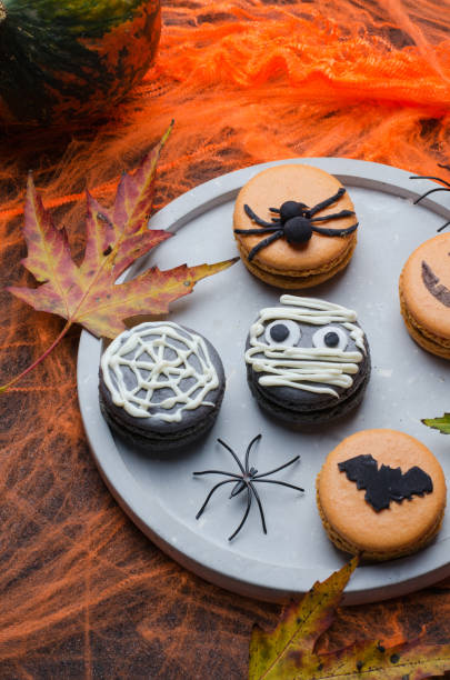 istock Halloween cookies on an orange background 2177837212