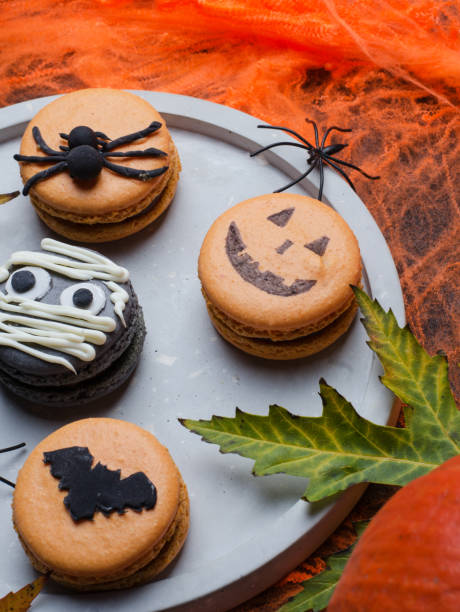 istock Halloween cookies on an orange background 2177837220