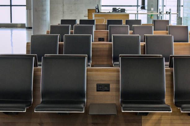 istock empty seats at international gate (zurich airport, switzerland) waiting area before flight closed row rows of chairs (seat chair) sitting terminal waiting flight delay departure arrival 2177838265
