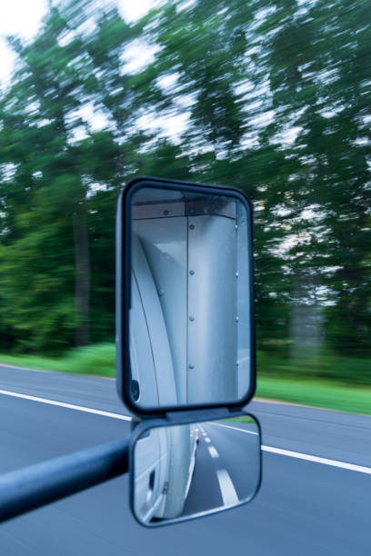 Close-Up Of Side View Mirror Of Car