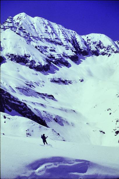 istock Spring Powder Skiing using the Telemark technique, Pearl Pass Colorado White River National Forest Maroon Bells Wilderness in April 1983 2177840346