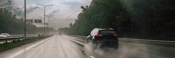 istock Car during the rain after hurricane 2177845618