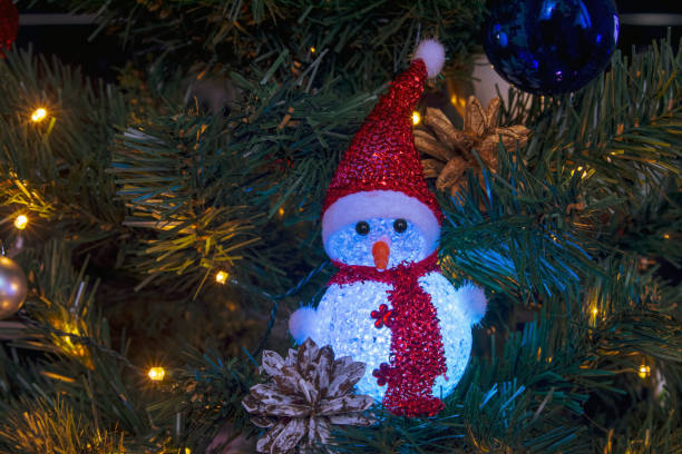 istock Colored Christmas decorations sparkle merrily on the Christmas tree, creating an atmosphere of magic and festive coziness 2177850305