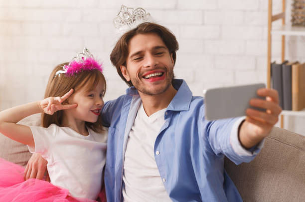 istock Cheerful family taking selfie on smartphone together 2177853942