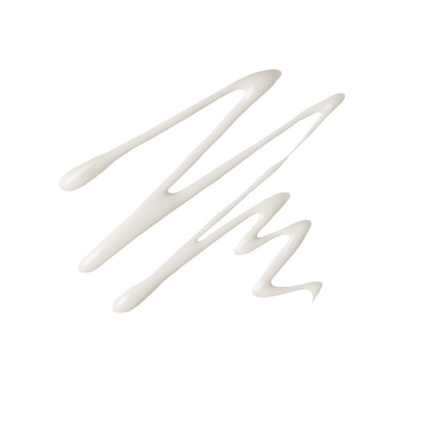 istock White smear stroke of cosmetic cream texture isolated on white background. 2177855980