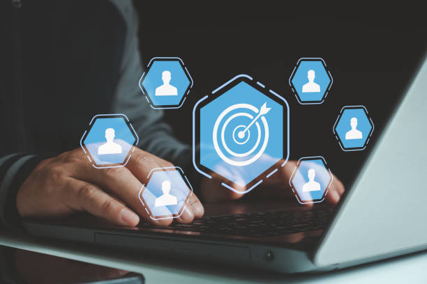 istock Target customer behaviour concept. Businessman use laptop with target customer icons for client focus groups. Digital marketing online technology, CRM, Data exchange development and customer service. 2177857493